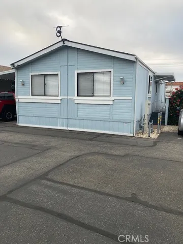 a front view of a house with a garage