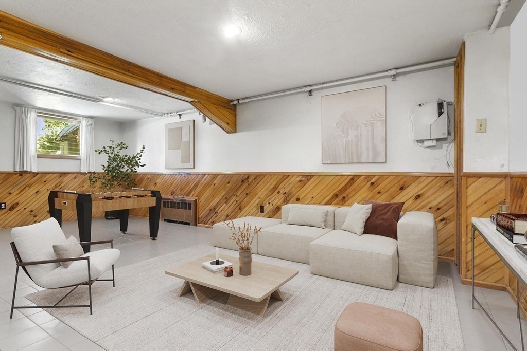 26 Shawsheen Road Bedford, MA 01730 - Photo 12 of 18 a living room with furniture and a large window