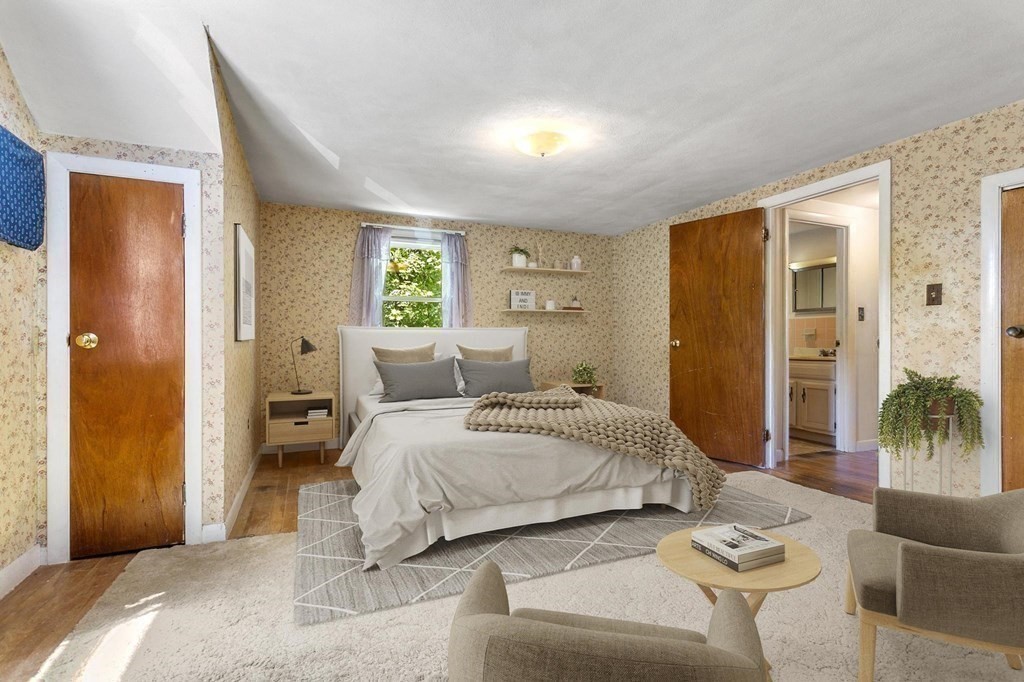 26 Shawsheen Road Bedford, MA 01730 - Photo 9 of 18 a spacious bedroom with a bed and furniture