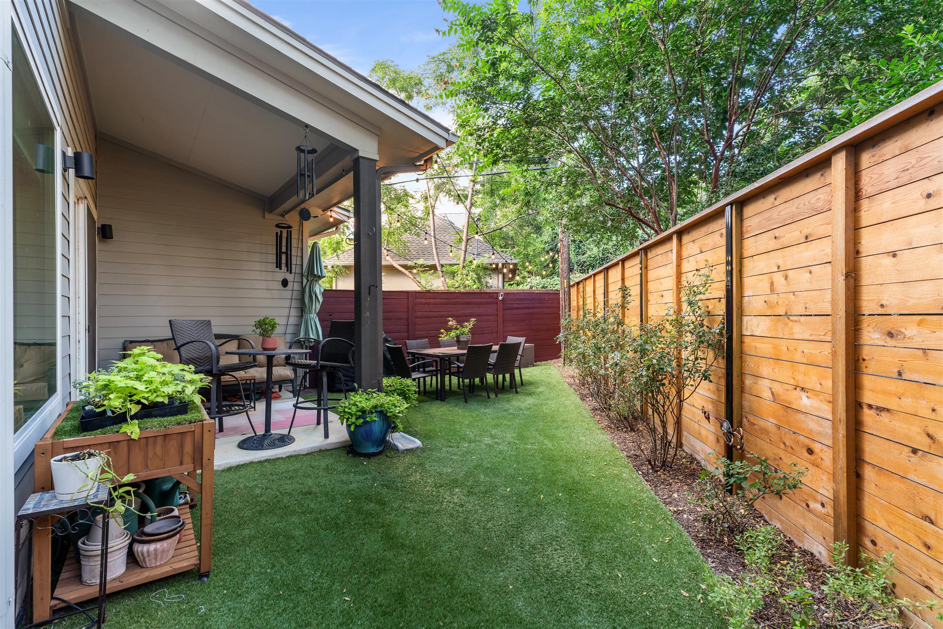 3806 Bull Creek Road, Unit B Austin, TX 78731 - Photo 10 of 37 Step outside to the covered patio, an inviting space perfect for year-round outdoor dining, entertaining, or simply relaxing.