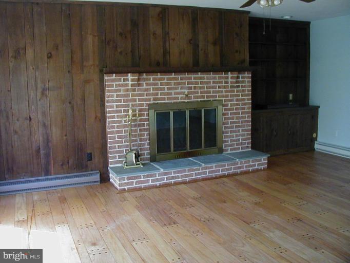 601 Windmill Road Easton, MD 21601 - Photo 2 of 8 Fireplace, floors just refinished