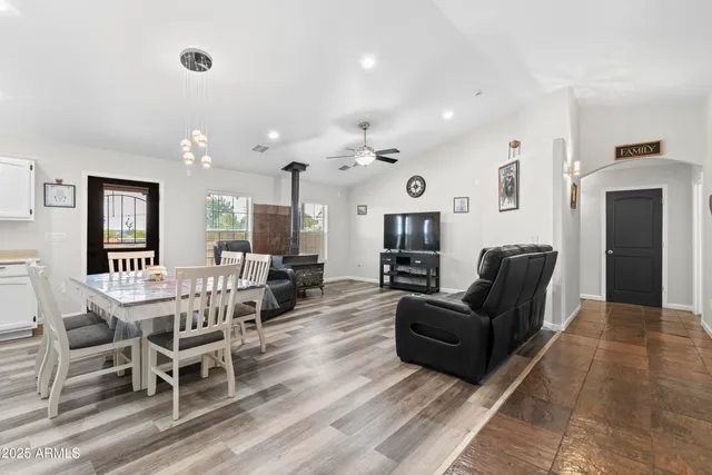 a living room with furniture and a rug