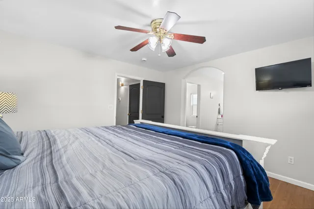 a kitchen with a sink cabinets and window