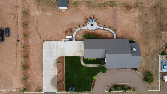 a view of a backyard with sitting area