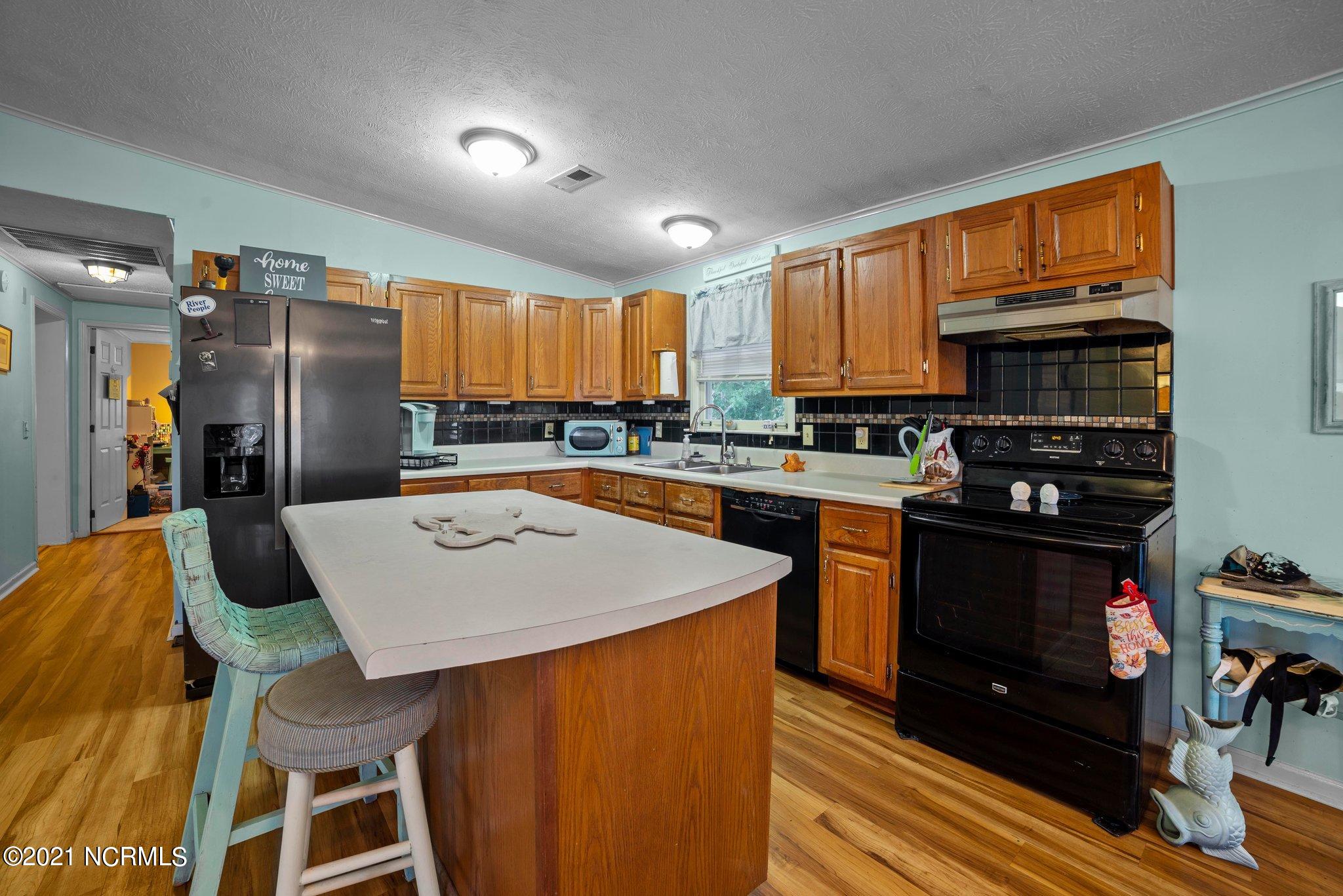 172 Great Neck Road Havelock, NC 28532 - Photo 6 of 29 Kitchen View with Tile Basksplash