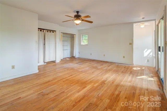 a view of an empty room and window