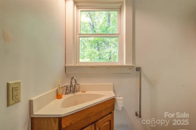 a bathroom with a sink and a vanity