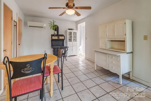 a view of kitchen with cabinets and outdoor space