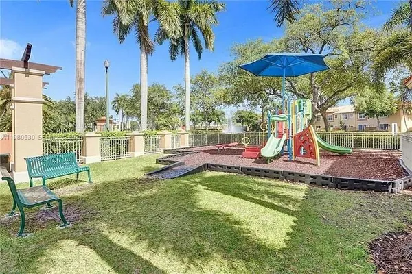 a view of a swimming pool with a lounge chairs