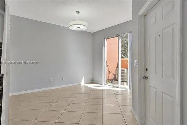 a view of an empty room with window