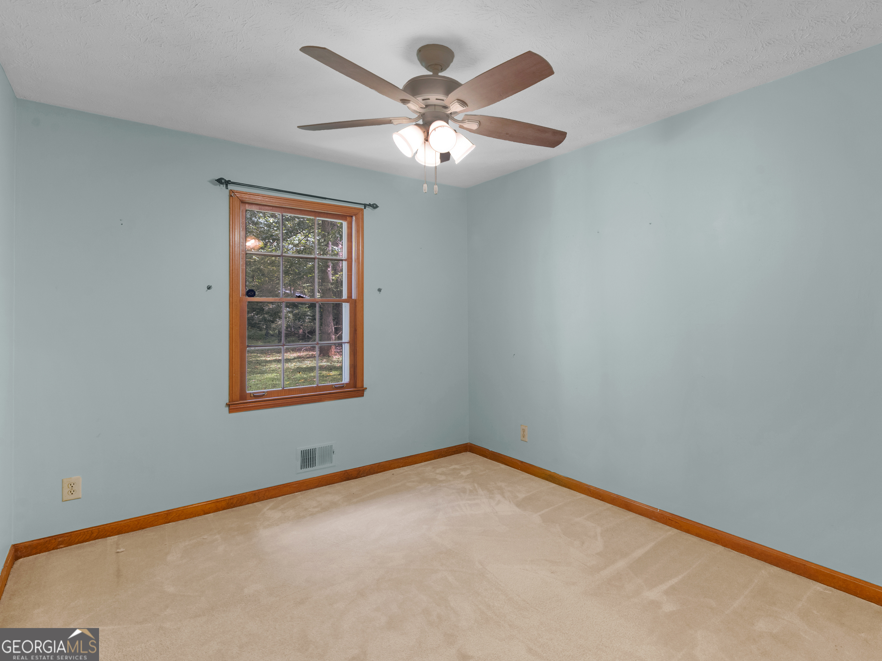 8294 Winston Way Jonesboro, GA 30236 - Photo 15 of 62 an empty room with a window
