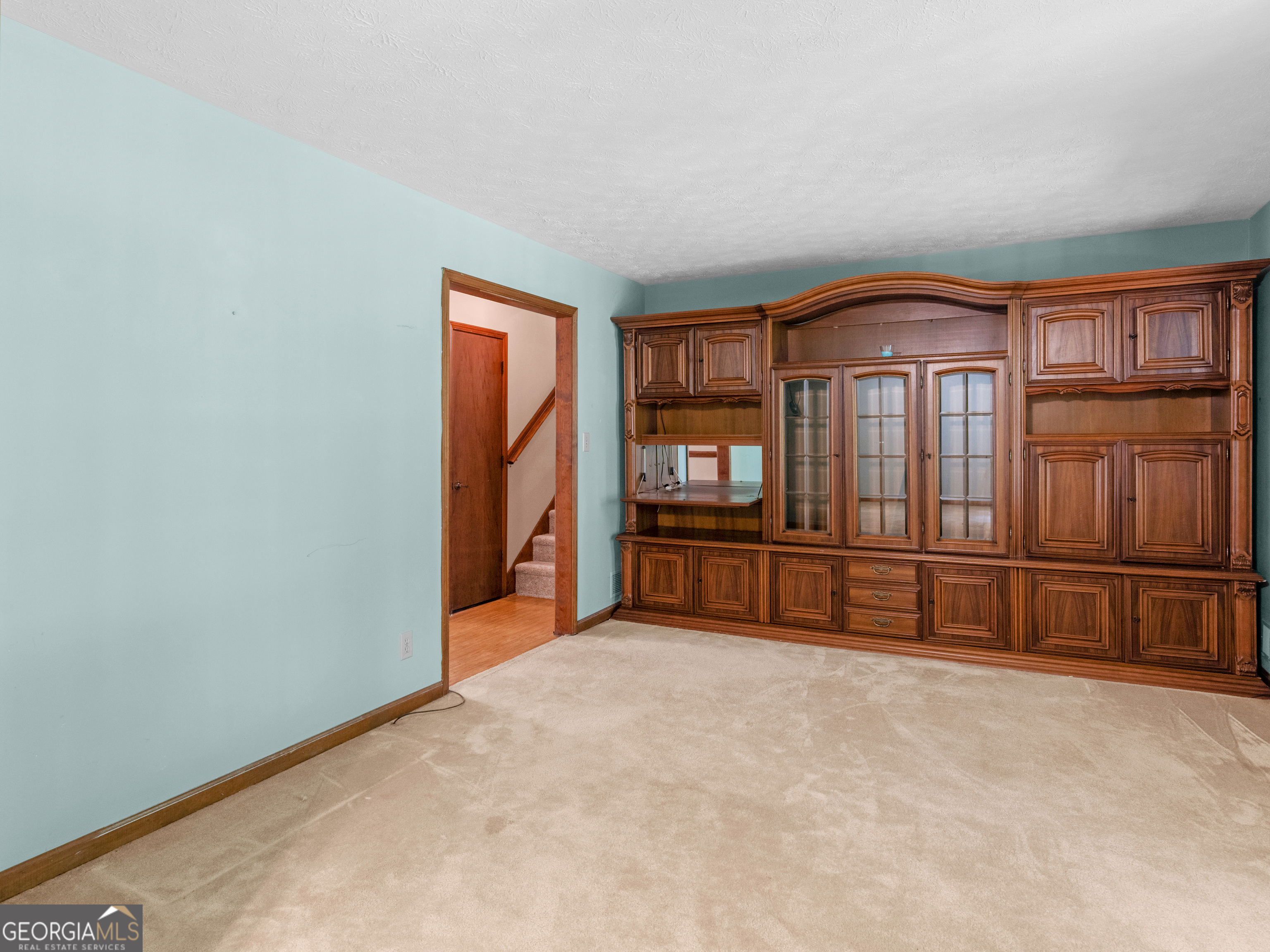 8294 Winston Way Jonesboro, GA 30236 - Photo 20 of 62 a view of an empty room with furniture and a window