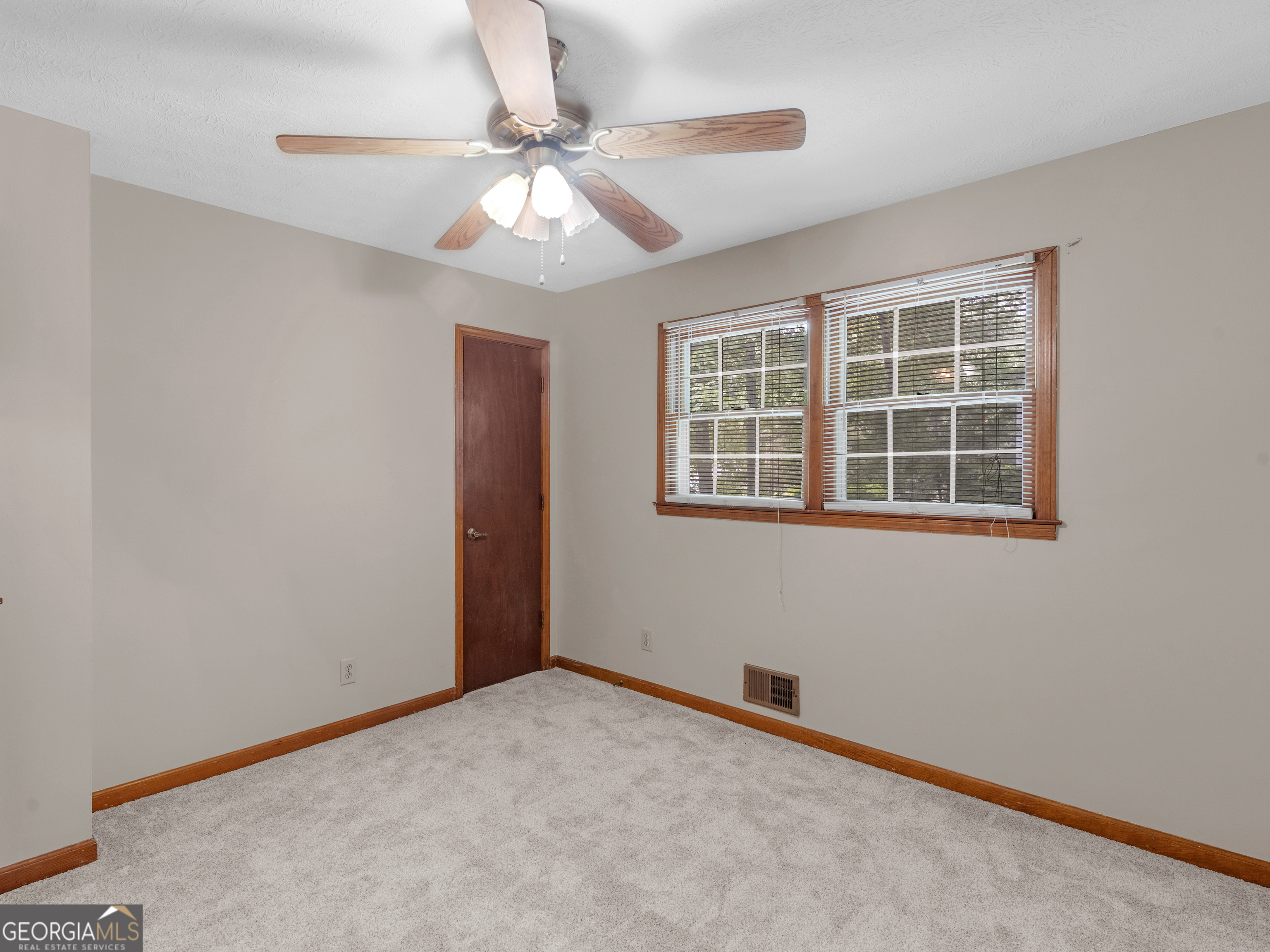 8294 Winston Way Jonesboro, GA 30236 - Photo 29 of 62 a view of an empty room with a window