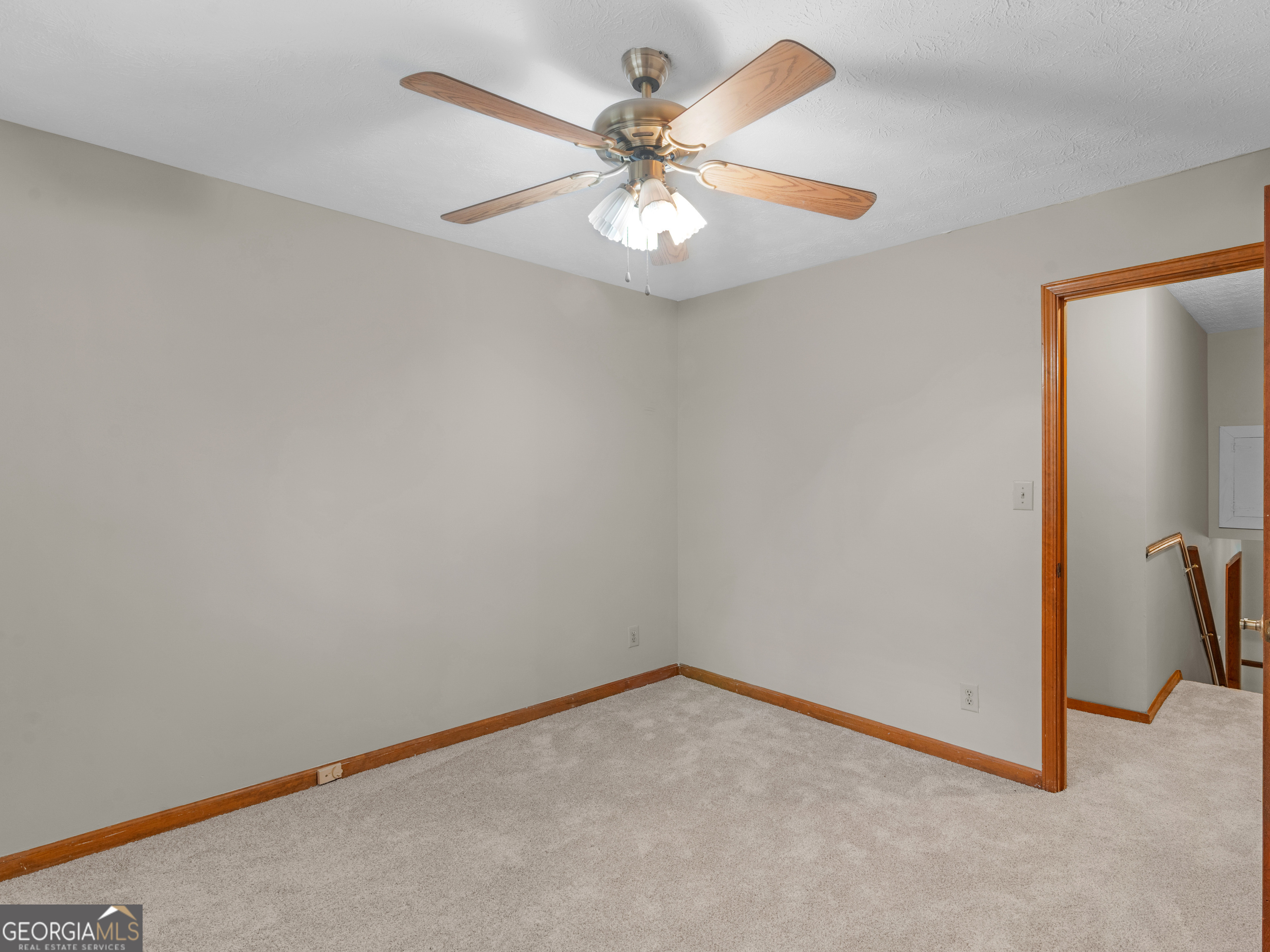 8294 Winston Way Jonesboro, GA 30236 - Photo 31 of 62 an empty room with windows and fan