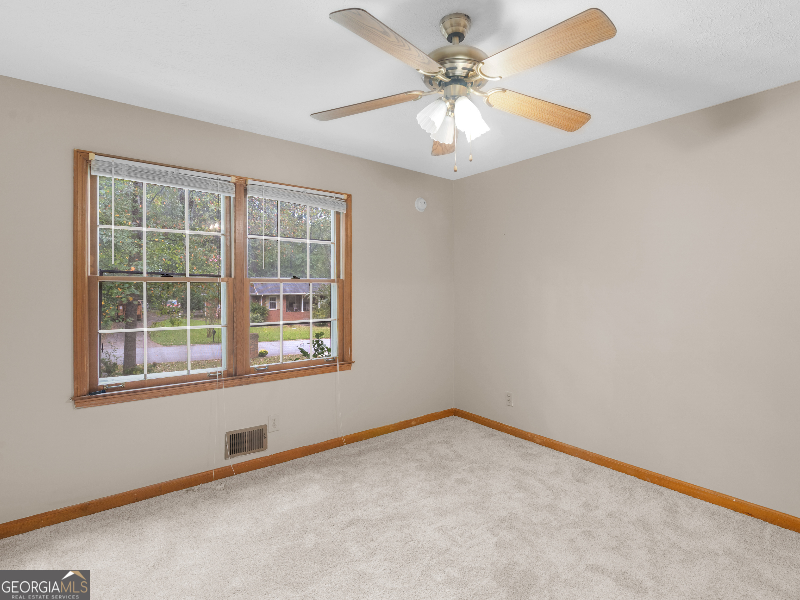 8294 Winston Way Jonesboro, GA 30236 - Photo 39 of 62 an empty room with a window
