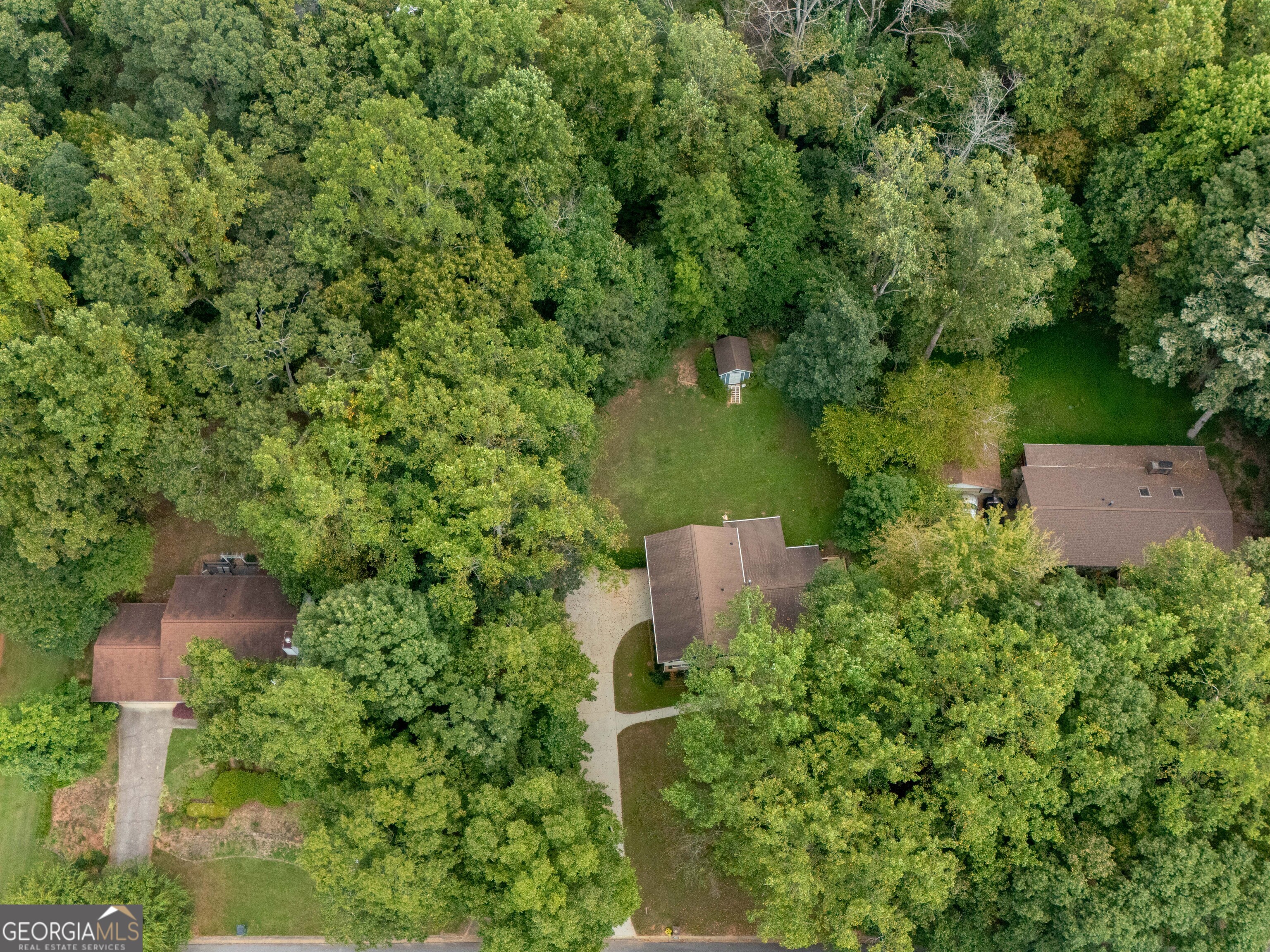 8294 Winston Way Jonesboro, GA 30236 - Photo 60 of 62 an aerial view of a house with a yard and lake view