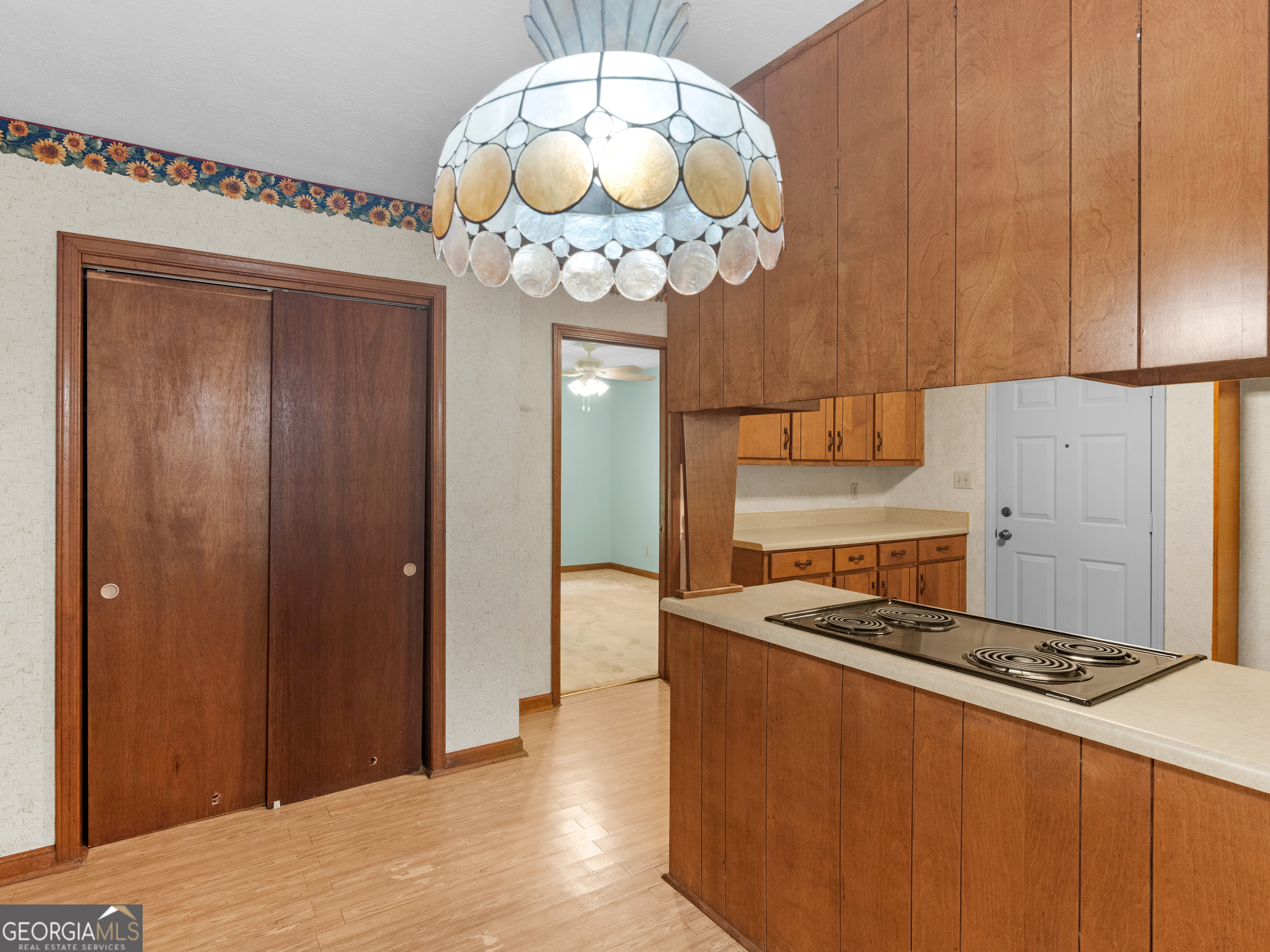 8294 Winston Way Jonesboro, GA 30236 - Photo 8 of 62 a kitchen with a stove and a table