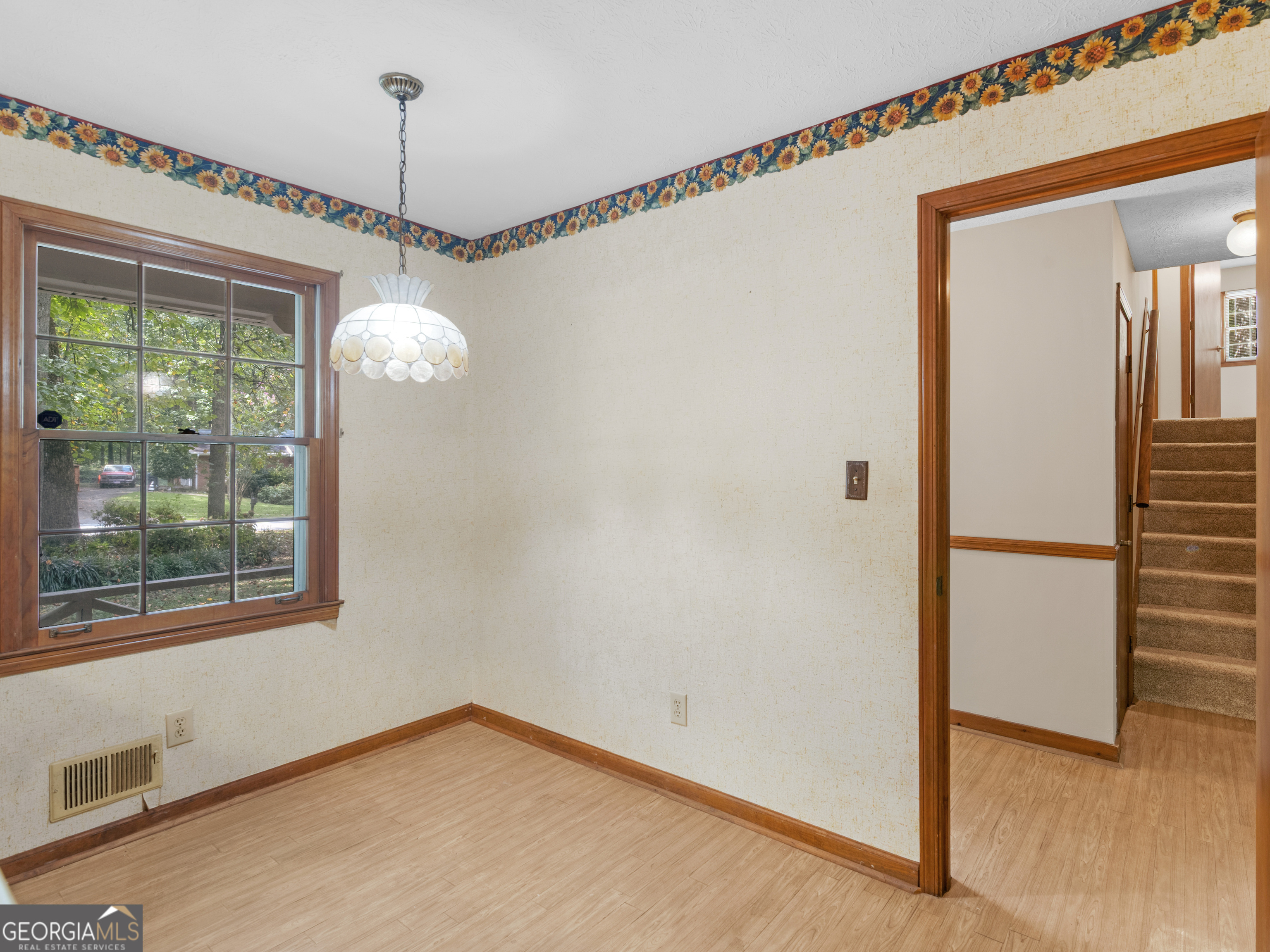 8294 Winston Way Jonesboro, GA 30236 - Photo 10 of 62 a view of a room with window wooden floor and outdoor view