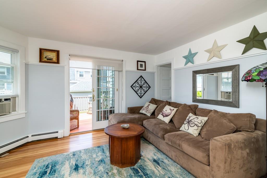 7 Mildred Street Hull, MA 02045 - Photo 11 of 26 a living room with furniture and a window