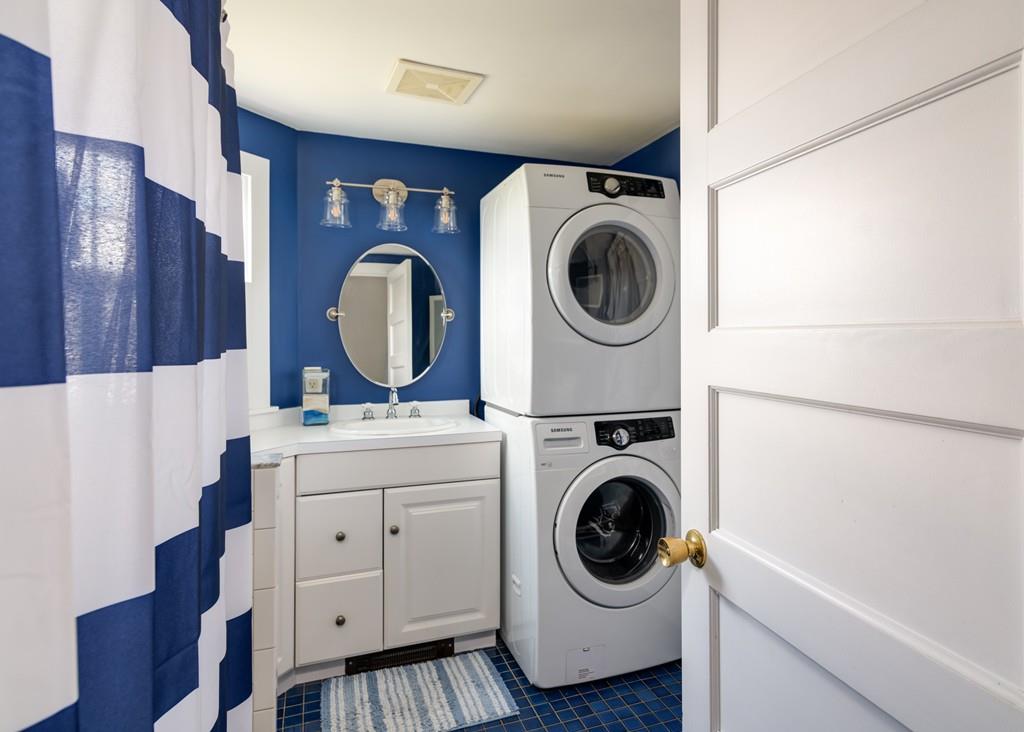 7 Mildred Street Hull, MA 02045 - Photo 17 of 26 a utility room with dryer and washer