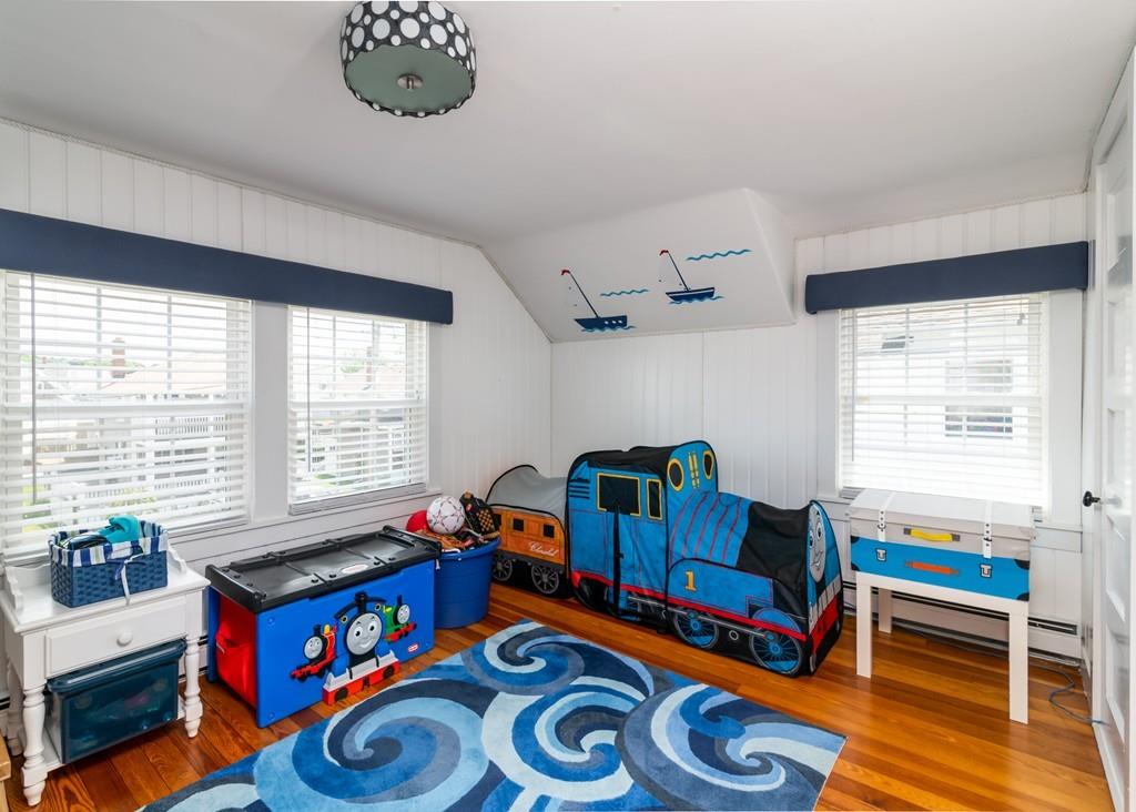 7 Mildred Street Hull, MA 02045 - Photo 18 of 26 a living room with furniture and a window
