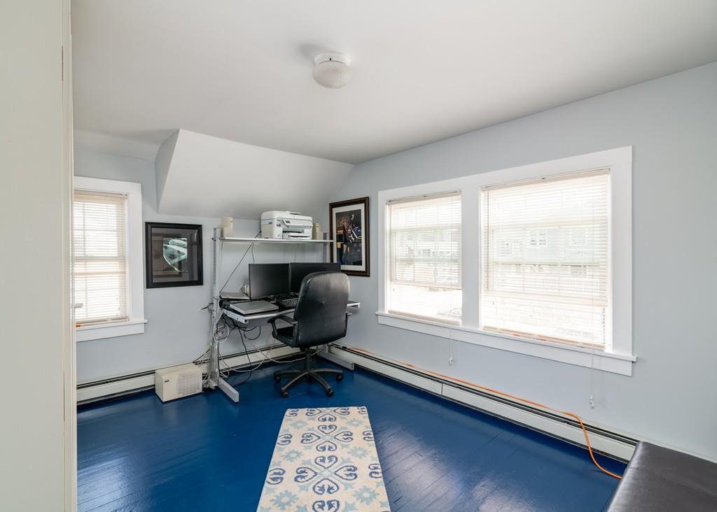 7 Mildred Street Hull, MA 02045 - Photo 19 of 26 a workspace with wooden floor and a window