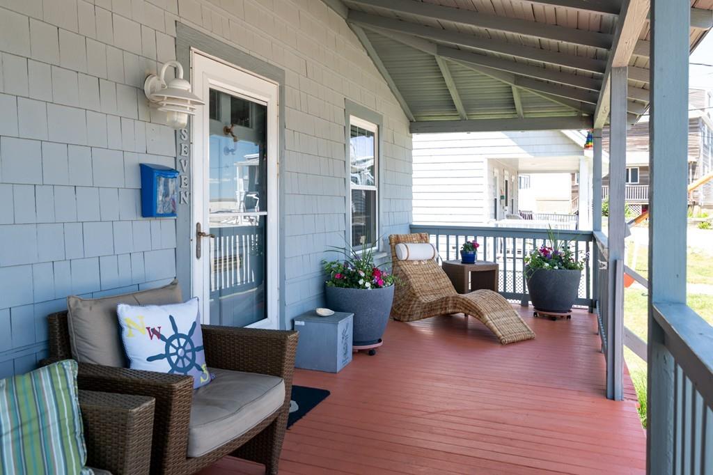 7 Mildred Street Hull, MA 02045 - Photo 6 of 26 a reading room with furniture and wooden floor