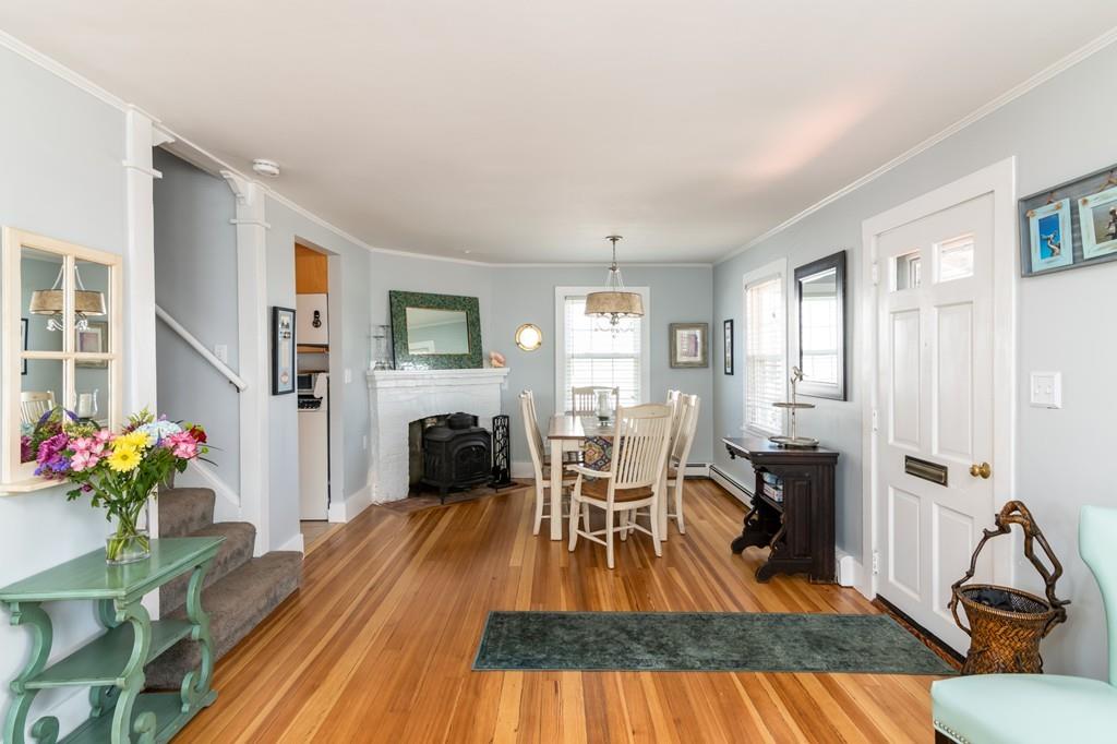 7 Mildred Street Hull, MA 02045 - Photo 7 of 26 a living room with furniture fireplace and wooden floor