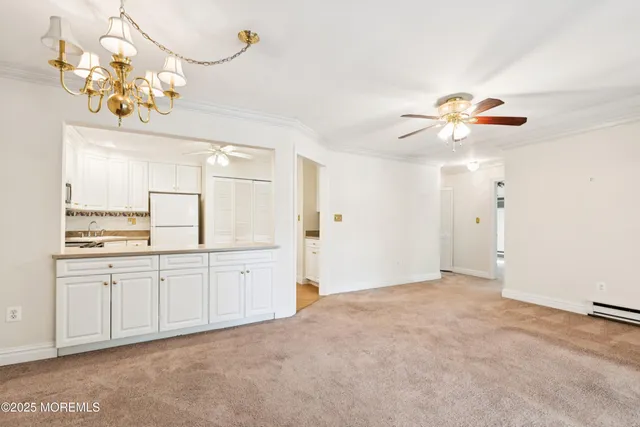 a spacious bathroom with a granite countertop sink a vanity and a mirror