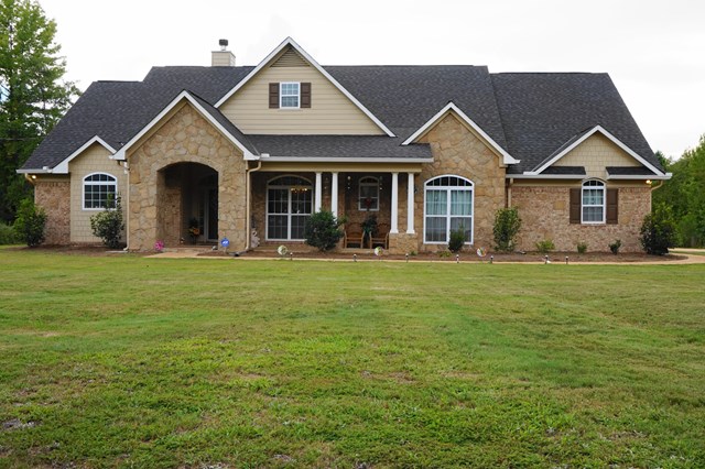 37 Copper Road Seale, AL 36875 - Photo 1 of 42 a front view of a house with yard and green space