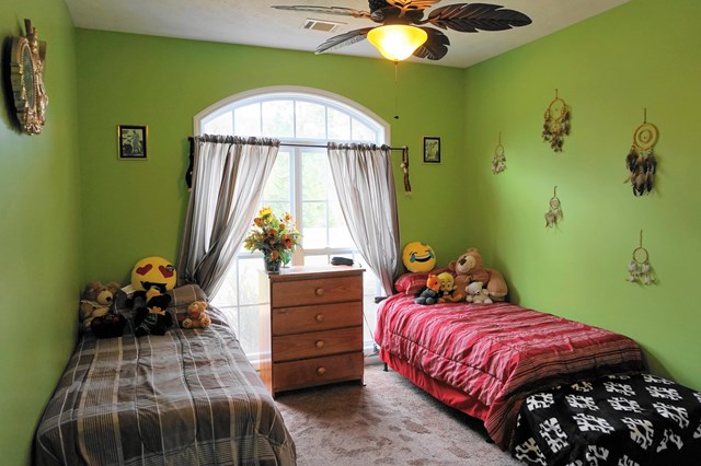 37 Copper Road Seale, AL 36875 - Photo 14 of 42 a bedroom with a bed and a window