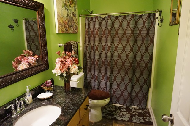 37 Copper Road Seale, AL 36875 - Photo 15 of 42 a bathroom with a toilet sink and curtain