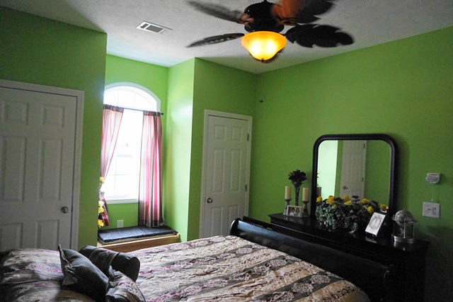 37 Copper Road Seale, AL 36875 - Photo 17 of 42 a bedroom with a bed and a mirror