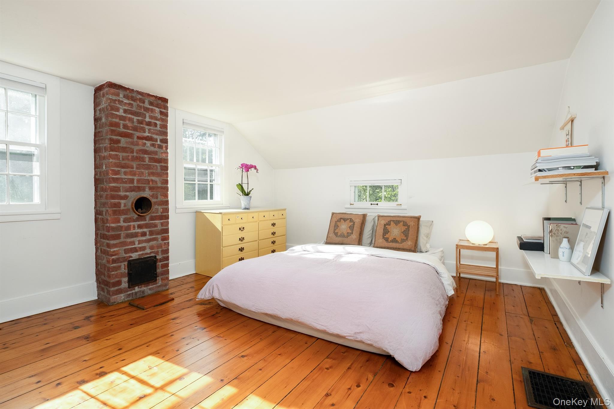 77 Upper Hook Road Rhinebeck, NY 12572 - Photo 24 of 48 a bedroom with a bed and a wooden floor