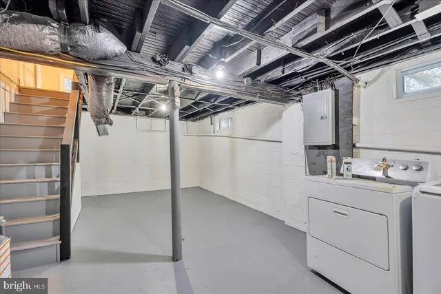 a utility room with cabinets