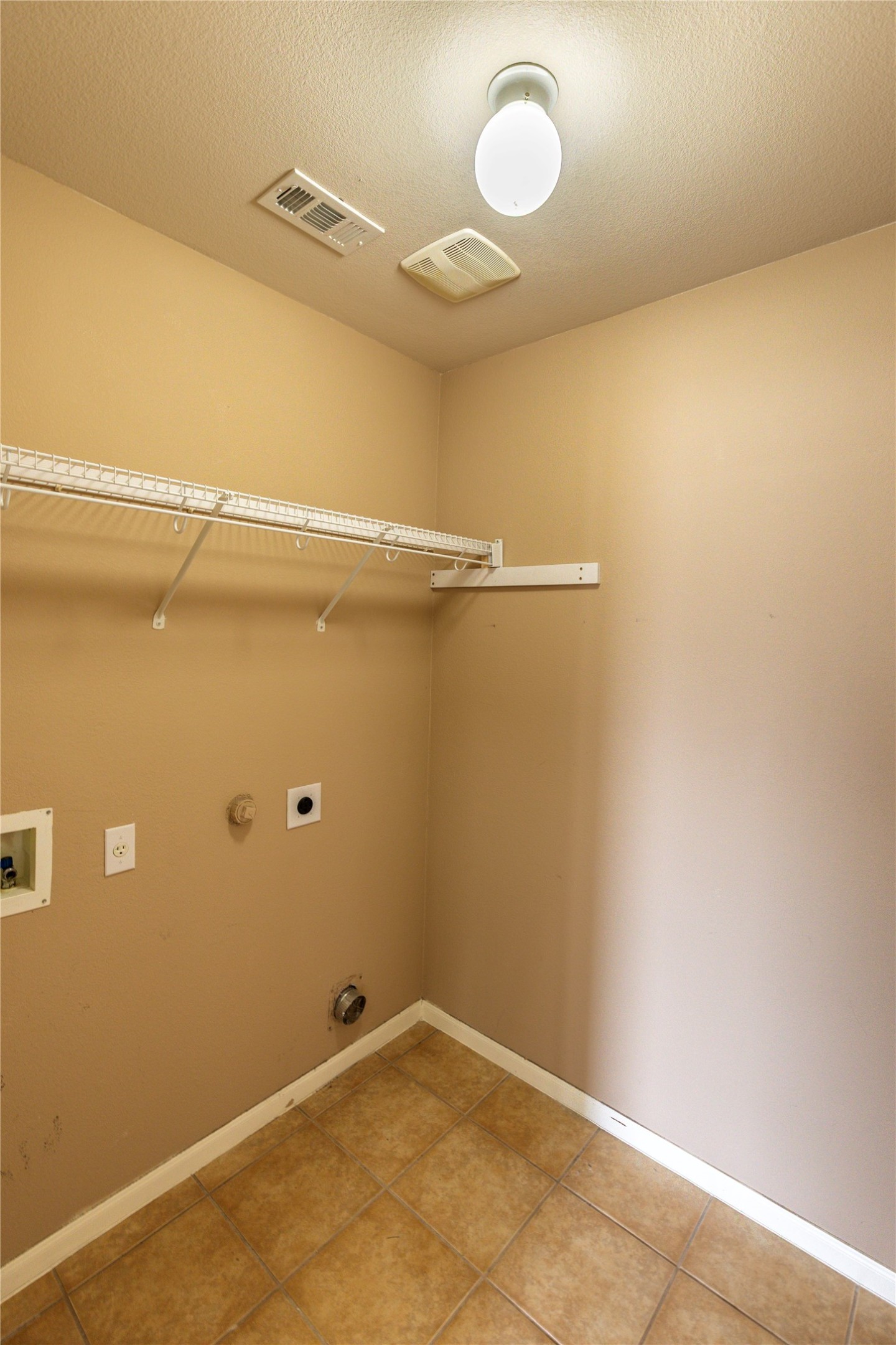 102 Thompson Trail Bastrop, TX 78602 - Photo 11 of 18 a view of a room with racks on the wall