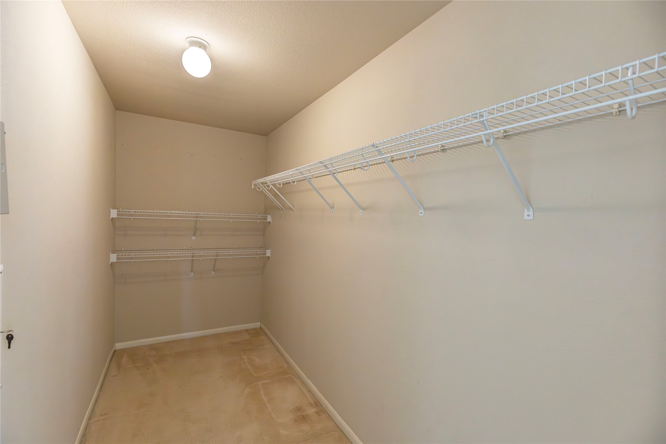 102 Thompson Trail Bastrop, TX 78602 - Photo 10 of 18 a view of a room with racks on the wall