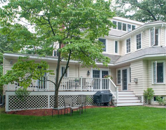 38 Gammons Road Newton, MA 02468 - Photo 8 of 10 a front view of a house with a garden