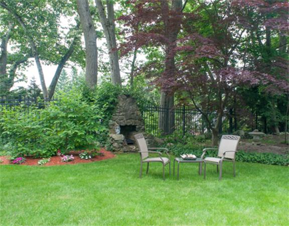 38 Gammons Road Newton, MA 02468 - Photo 9 of 10 a view of green field with sitting area