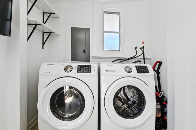 a utility room with dryer and washer