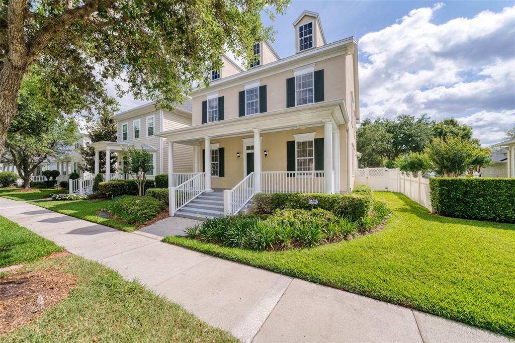 a front view of a house with garden