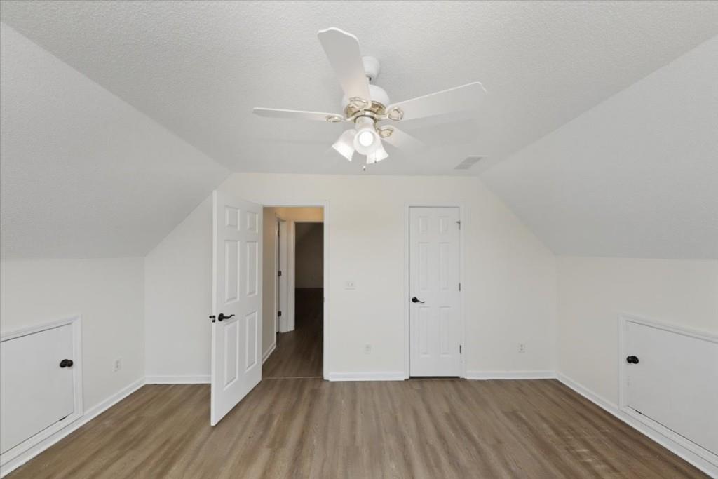 2515 Lakeview Trail Cumming, GA 30041 - Photo 22 of 27 wooden floor in an empty room with a window