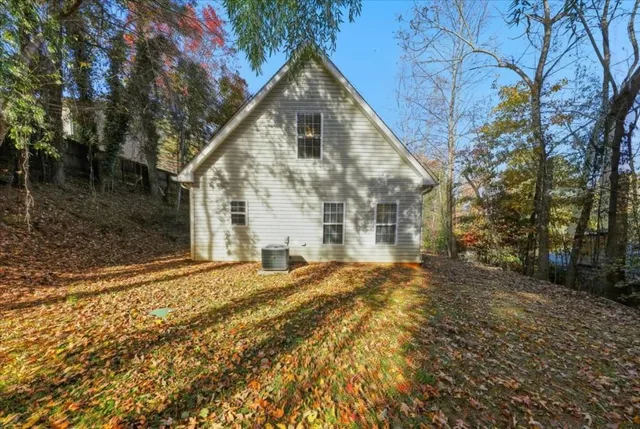a view of front of house with a yard