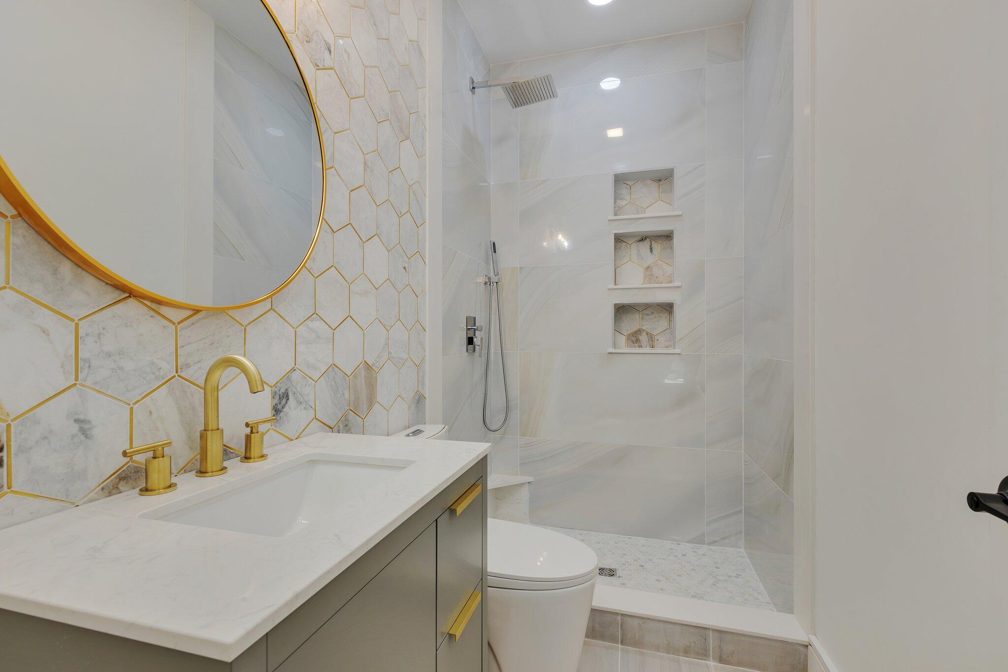 72 5 Corners Road Centerville, MA 02632 - Photo 14 of 48 a bathroom with a sink a toilet and shower