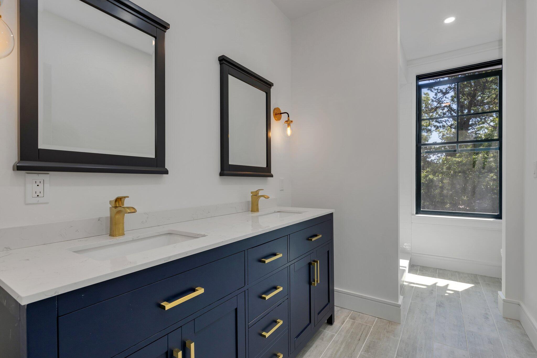 72 5 Corners Road Centerville, MA 02632 - Photo 34 of 48 a bathroom with 2 sink and a mirror