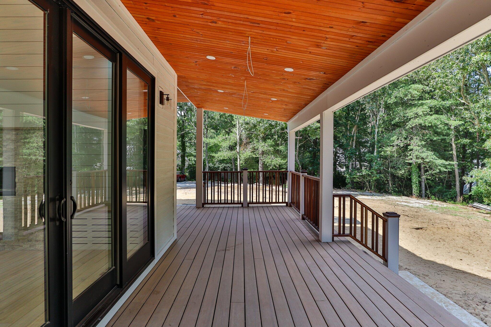 72 5 Corners Road Centerville, MA 02632 - Photo 35 of 48 a view of a balcony with wooden floor