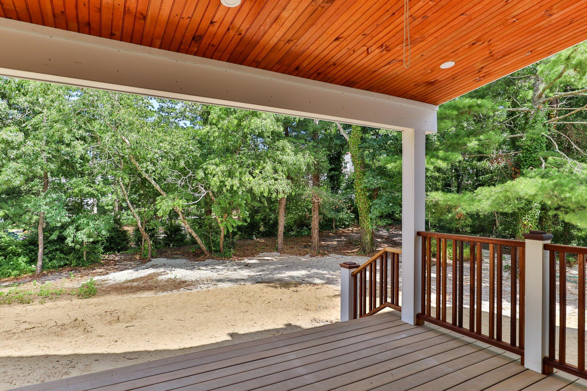 72 5 Corners Road Centerville, MA 02632 - Photo 38 of 48 a view of a couches with wooden floor and roof
