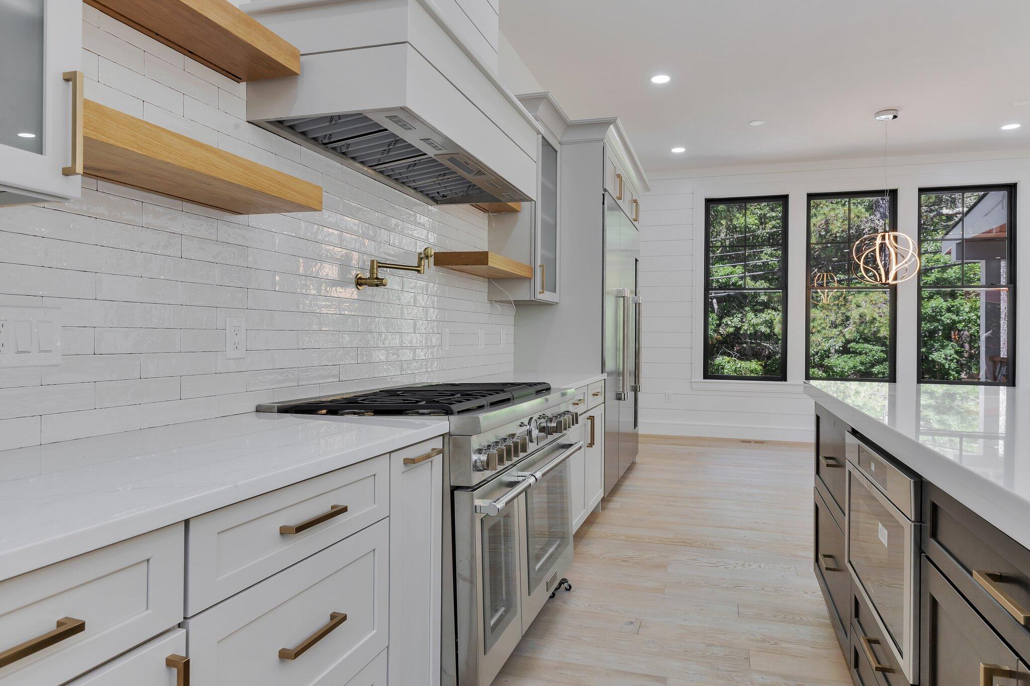 72 5 Corners Road Centerville, MA 02632 - Photo 8 of 48 a kitchen with a stove and a sink