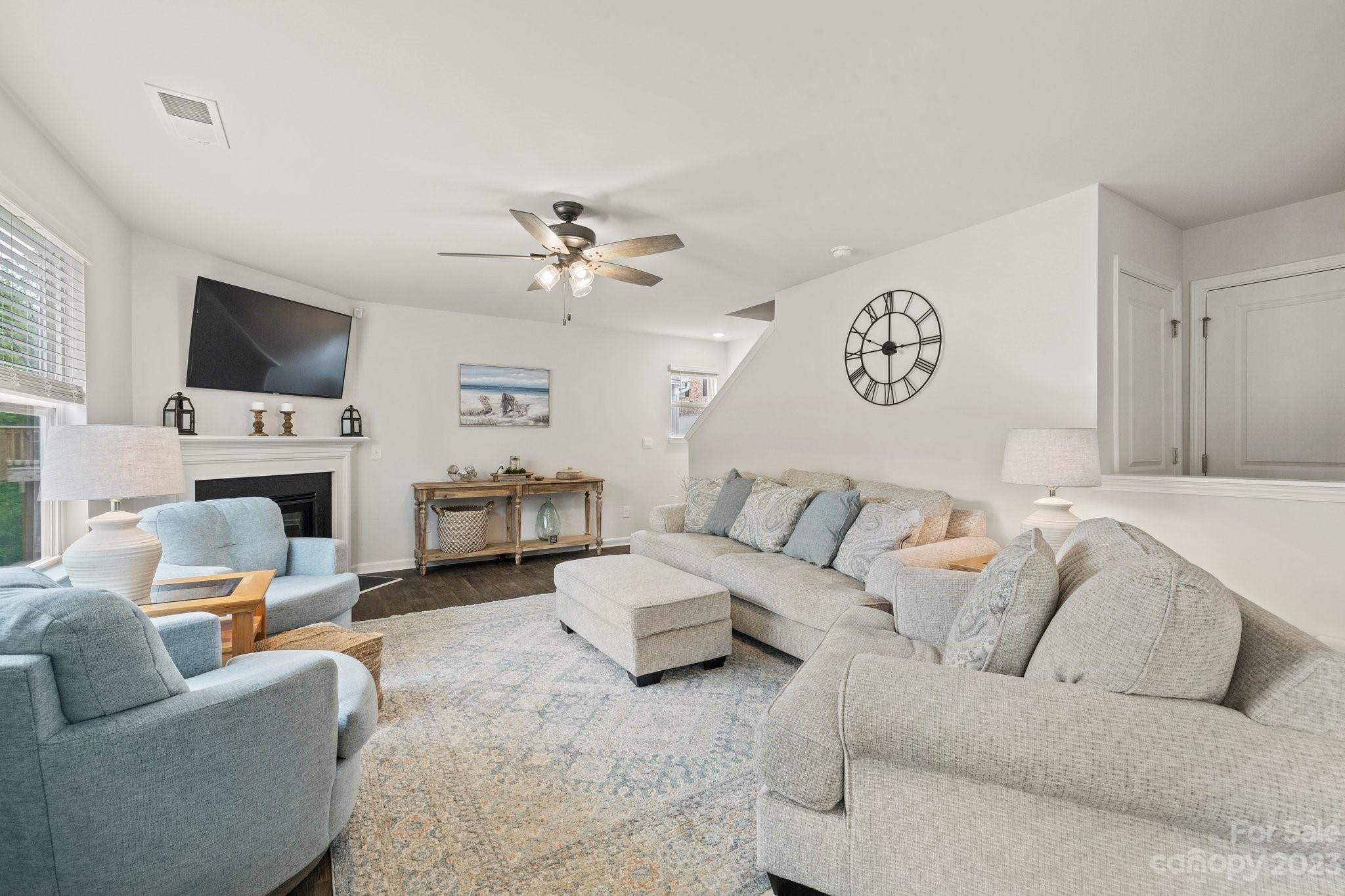 38 Hamrick Drive Candler, NC 28715 - Photo 14 of 37 a living room with furniture fireplace and a flat screen tv