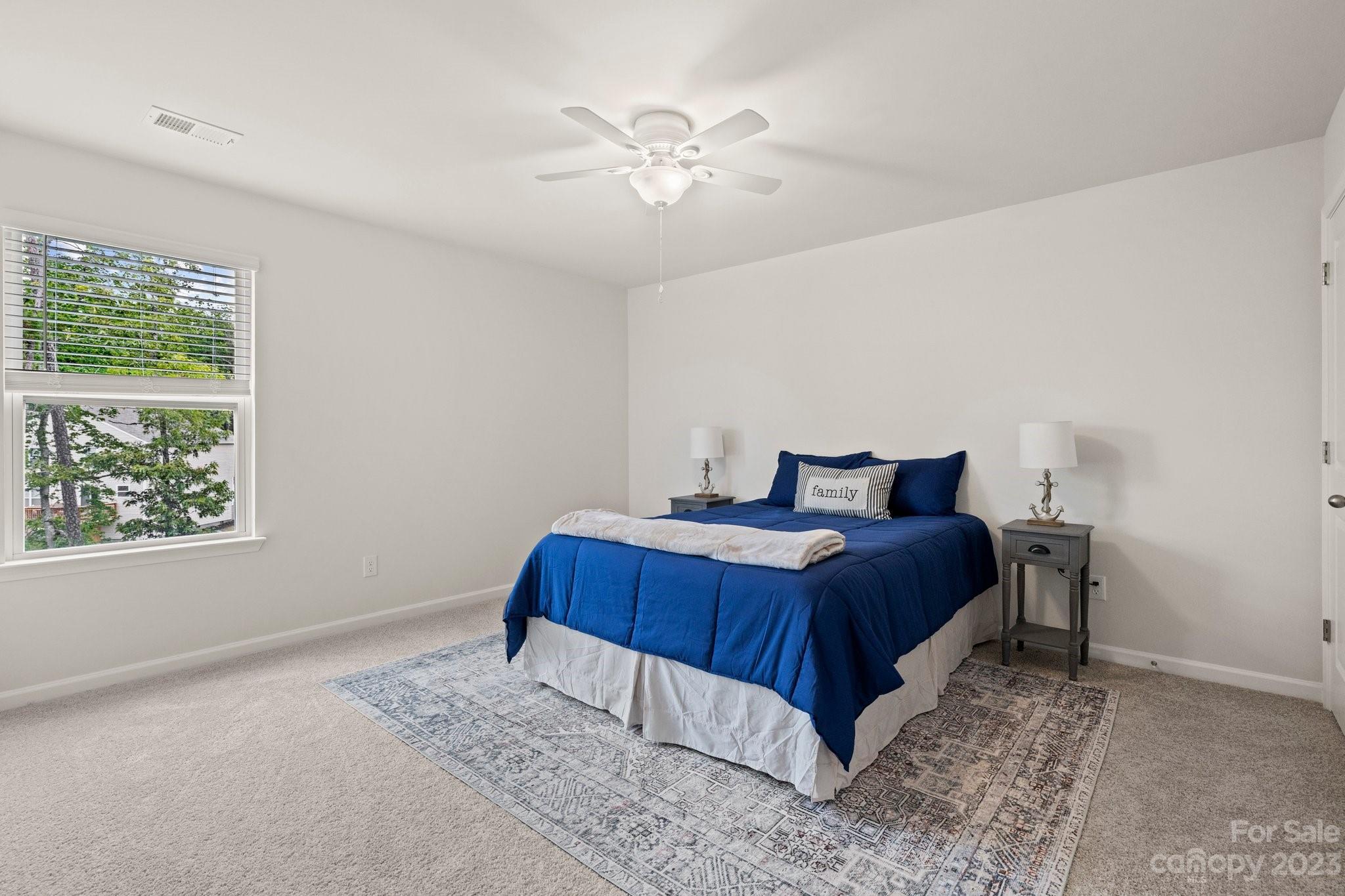 38 Hamrick Drive Candler, NC 28715 - Photo 26 of 37 a bedroom with a bed and window